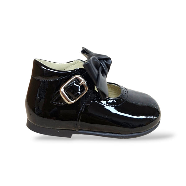panyno-b1528-ballerina-bambolina-primi-passi-bambina-nero-vernice-lucida-fiocco-estraibile-fibbia-classica-elegante-cerimonia-battesimo-taglie-19-23-scarpetteria-gica-trani
